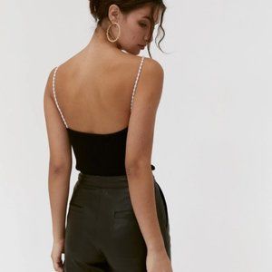 Musier halter top with pearl straps.